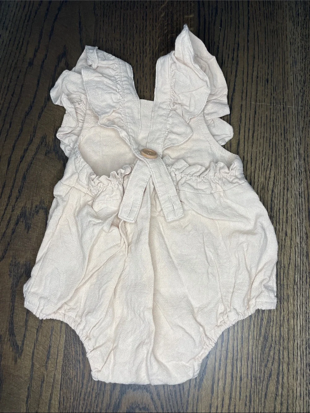 Beige Ruffled Infant Romper with Snap Closures
